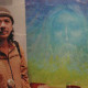 Carlos Santana next to “In His Image”